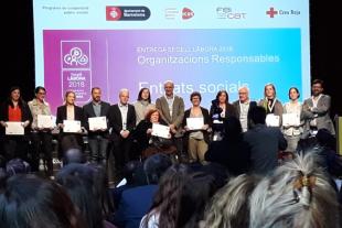 Suara Cooperativa i Garbet Cooperativa d’Inserció recollint el segell