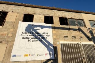 Building under construction with the sign for the expansion of Children's Shelter